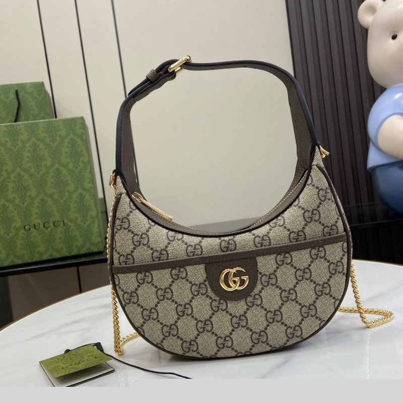 G*u*i top handle bags